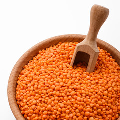 raw lentils on a white acrylic background