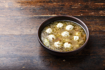 soup with meatballs on a plate