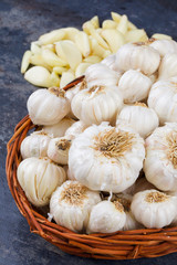 Pile of Fresh Organic Garlic on Vintage Wooden Background