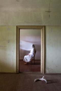 woman sitting on a chair