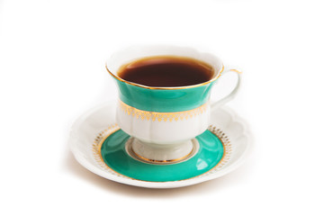 Green indian cup of tea on white background. Isolated on white