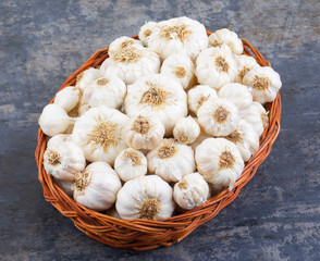 Pile of Fresh Organic Garlic on Vintage Wooden Background