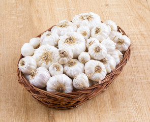 Pile of Fresh Organic Garlic on Vintage Wooden Background