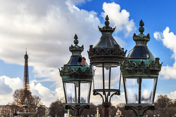 Fototapeta na wymiar Lantern streetlight at place de la Concorde in Paris, France. Eiffel tower in the background