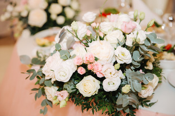 Wedding bouquet in restaurant on the table