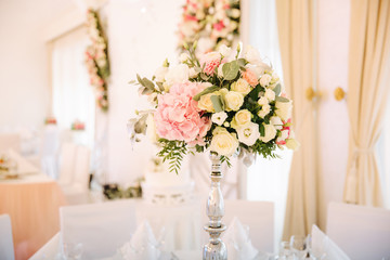 Wedding bouquet in restaurant on the table