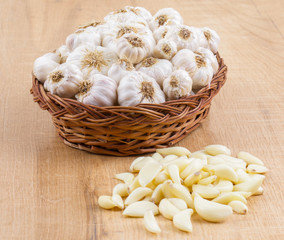 Pile of Fresh Organic Garlic on Vintage Wooden Background