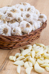Pile of Fresh Organic Garlic on Vintage Wooden Background