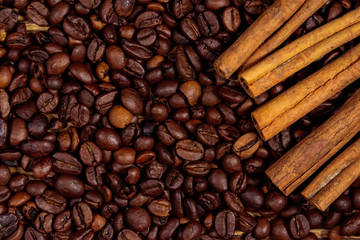 Roasted coffee beans and cinnamon sticks