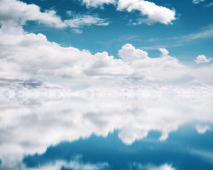 blue sky reflective on the water background