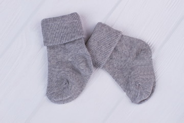 Pair of grey kid socks.