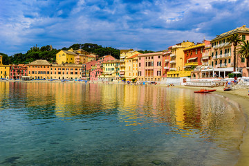 Fototapeta na wymiar Sestri Levante - Paradise Bay of Silence with its boats and its lovely beach. Beautiful coast at Province of Genoa in Liguria, Italy, Europe.