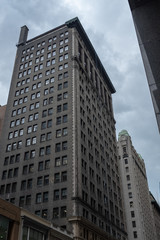 Naklejka premium Old brick build sky scraper