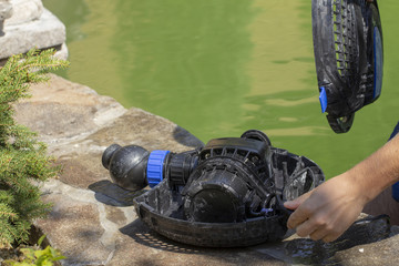 Repair of the water pump for a small decorative pond with a fountain