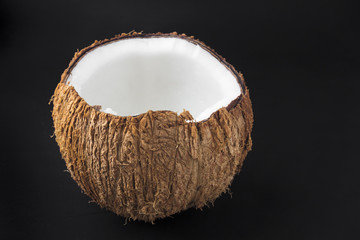 coconuts isolated on black background close up