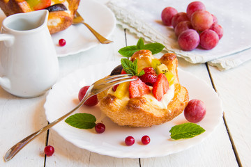 Delicious dessert with cream and fruit
