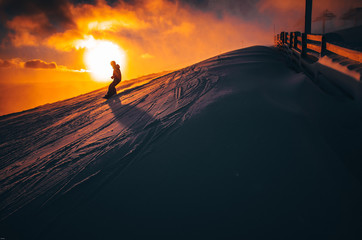 Silhouette of a skier on the hill. Sport and active life