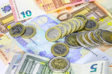 euro banknotes and coins