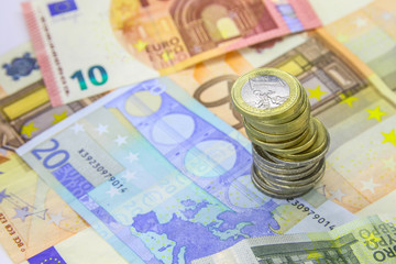 euro banknotes and coins