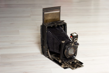 Folding cameras fold into a compact and rugged package for storage.