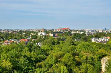 Fototapeta na wymiar Beautiful urban landscape. View of the city of Krakow from the Zakrzowek quarry.