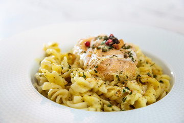 tasty pasta with salmon on a the table