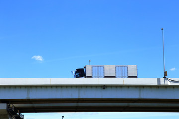 Fototapeta na wymiar Truck driving on Metropolitan Expressway