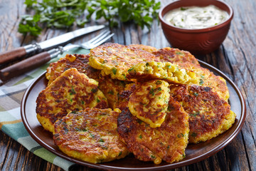 baked corn fritters on a plate