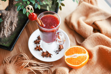 Set of food items which are smoothie, orange and bonsai