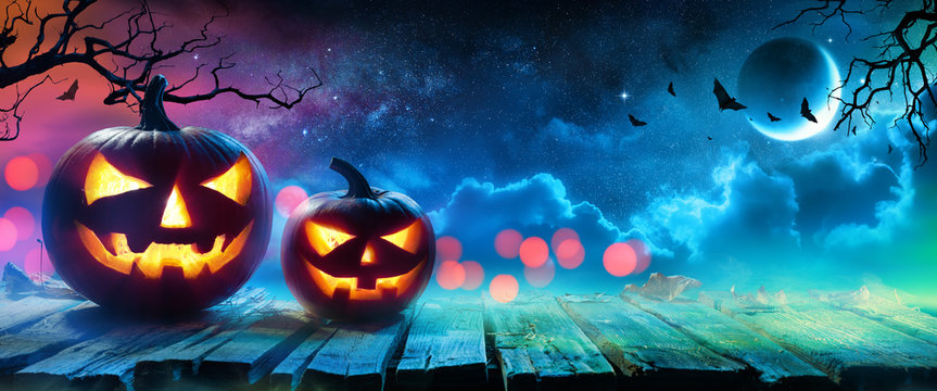 Halloween Pumpkins Glowing In Fantasy Night
