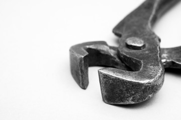 Tools for pulling nails - old metal pliers.