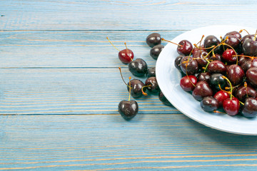 Fresh Berries on Rustic Wooden Background for Design Montage or Layout