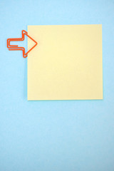 Empty post it notes with paperclips