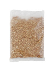 Dry Raw Buckwheat Grains in Boiling Package for Cooking Isolated