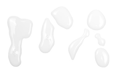 Spilled milk puddle isolated on white background and texture, top view