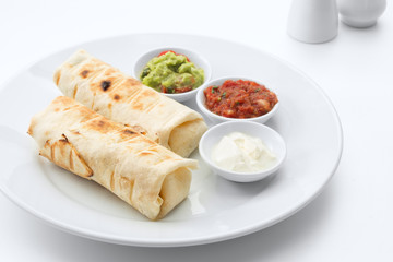 close up view of nice fresh yummy Mexican burritos on white back