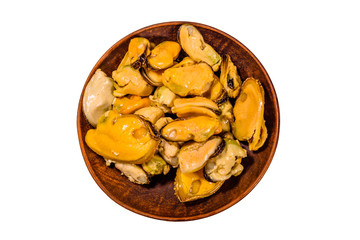 Ceramic plate with prepared mussels isolated on a white background