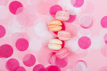 French macarons on pink background