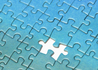 One piece missing from a color puzzle.