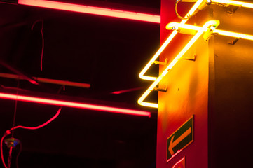 Corridor in basement  with neon lights showing way