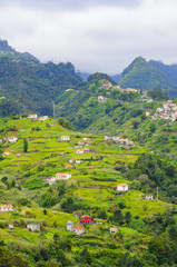 Naklejka na ściany i meble Mountain landscape. View of mountains on the route Vereda da Penha de Aguia, Madeira Island, Portugal, Europe.