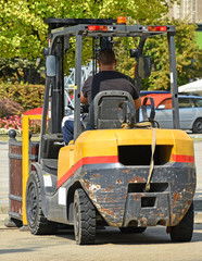 Forklift at work on the street