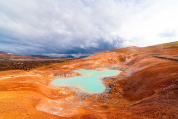 Sulfur springs on slope of a clay hill, volcanic region of Iceland