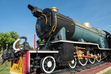 Antique green  locomotive stream train