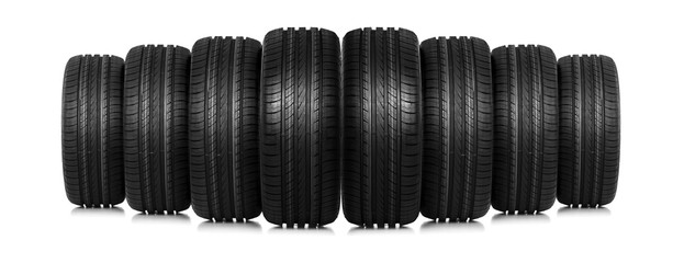 Group of car tires isolated on white.