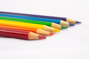 Rainbow colored pencils at an angle