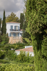 Fototapeta na wymiar luxury mediterranean villa with balconys in a mediterranean landscape