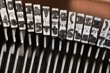 Retro typewriter in studio. Macro close up.