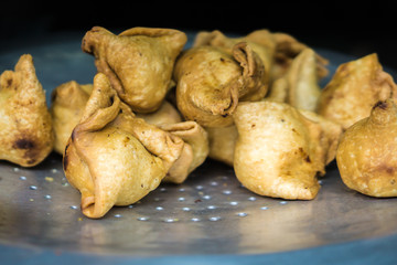 Hot samosas fresh out of the fryer