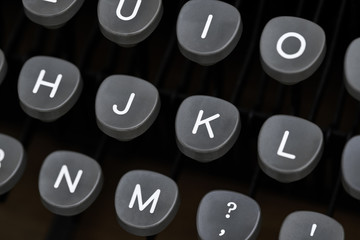 Retro typewriter in studio. Macro close up.